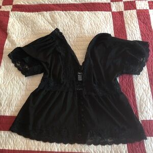 Cute black women top. Lace trim.
